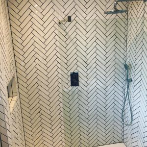 Shower room herringbone tiling