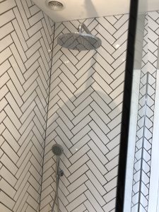 Shower room herringbone tiling