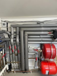 Coach house heat pump plant room