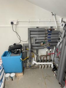 Coach house heat pump plant room