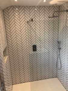 Shower room herringbone tiling